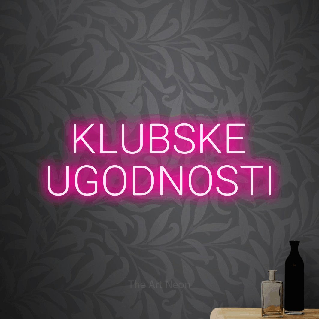 LED neon sign reading “KLUBSKE UGODNOSTI”, arranged in two lines.
