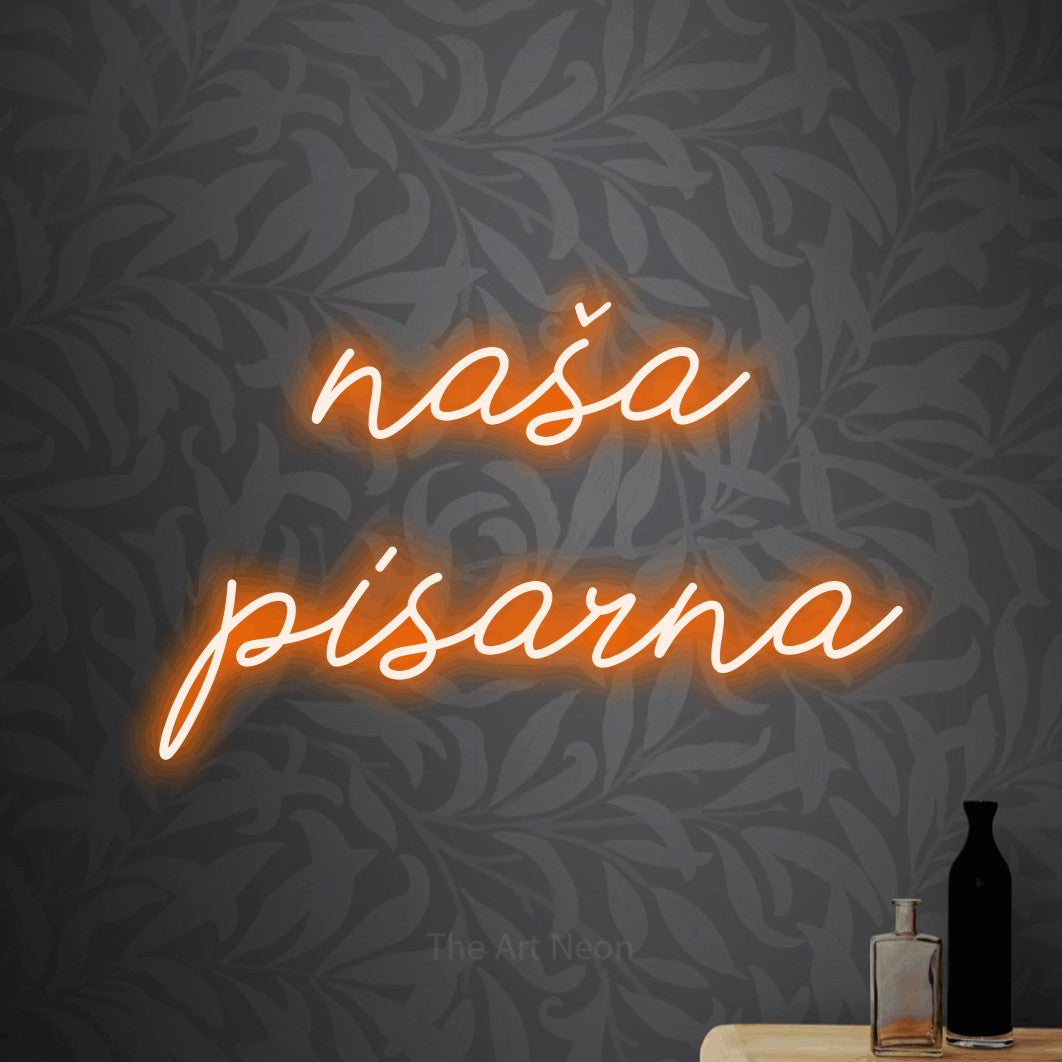 LED neon sign reading “naša pisarna”, arranged in two lines.
