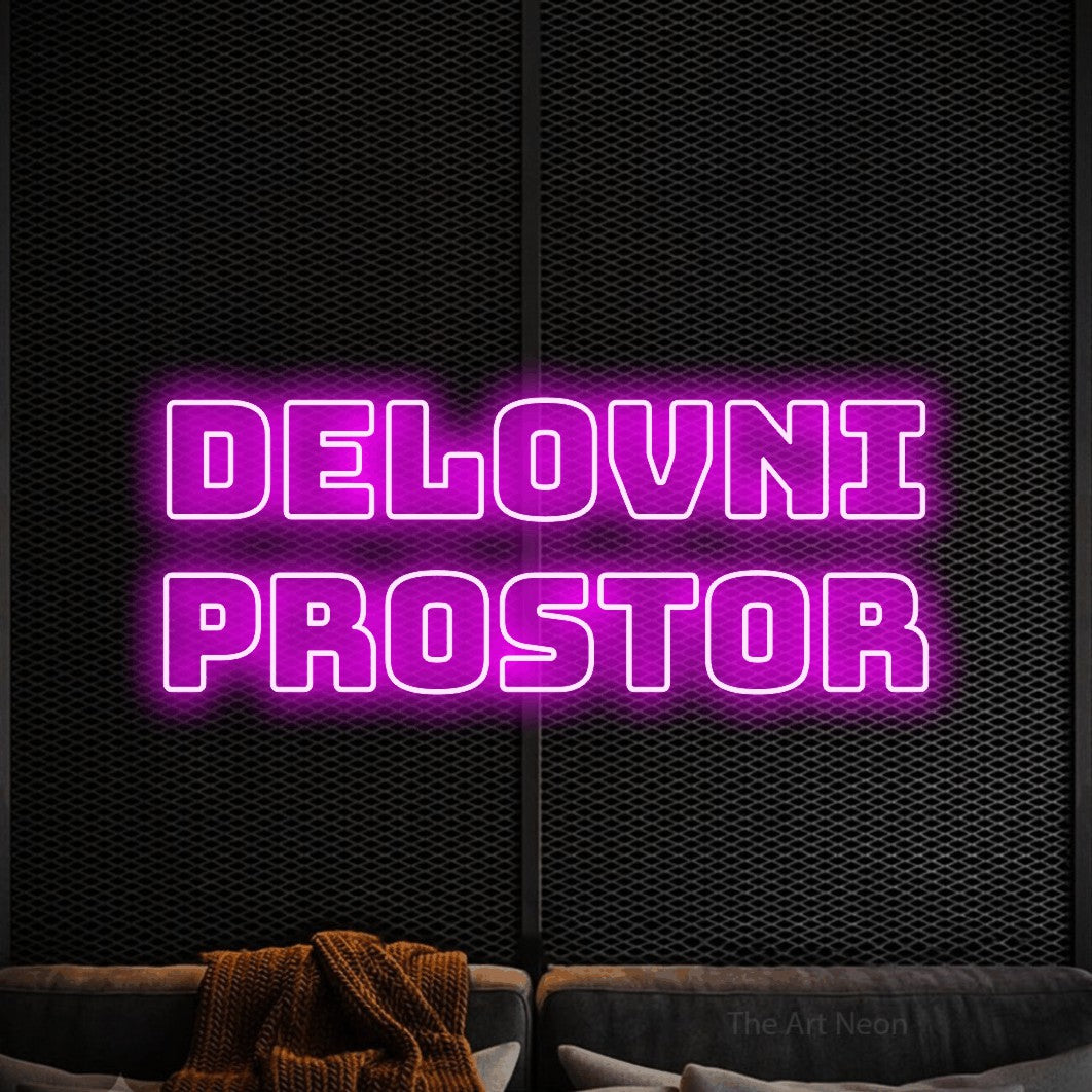 LED neon sign reading “delovni prostor”, arranged in two lines.