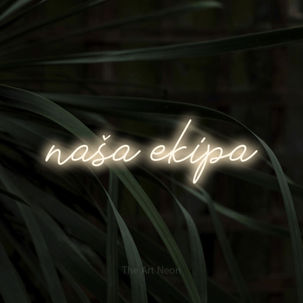 LED neon sign reading “naša ekipa”, arranged in a single line.