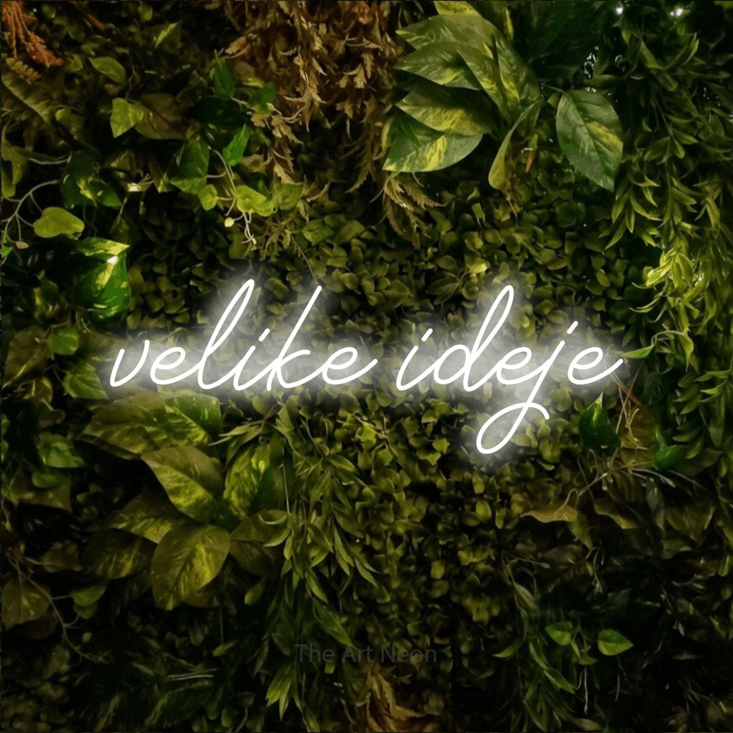 LED neon sign reading “velike ideje”, arranged in a single line.
