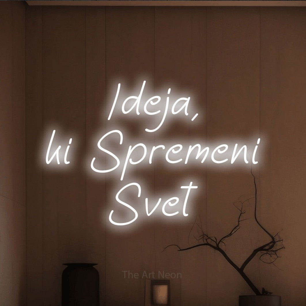 LED neon sign reading “Ideja, ki Spremeni Svet”, arranged in three lines.