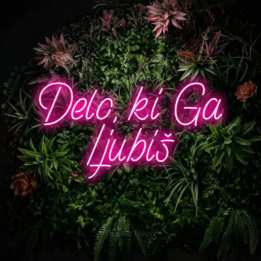 LED neon sign reading “Delo, ki Ga Ljubiš”, arranged in two lines.