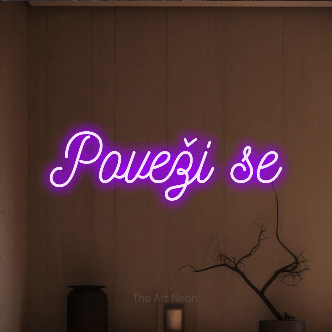LED neon sign reading “Poveži se”, arranged in a single line.