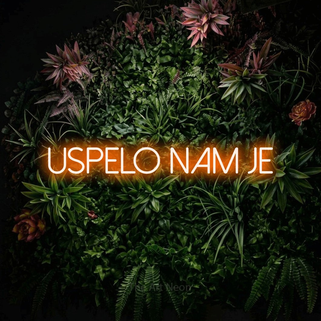 LED neon sign reading “Uspelo Nam je”, arranged in a single line.