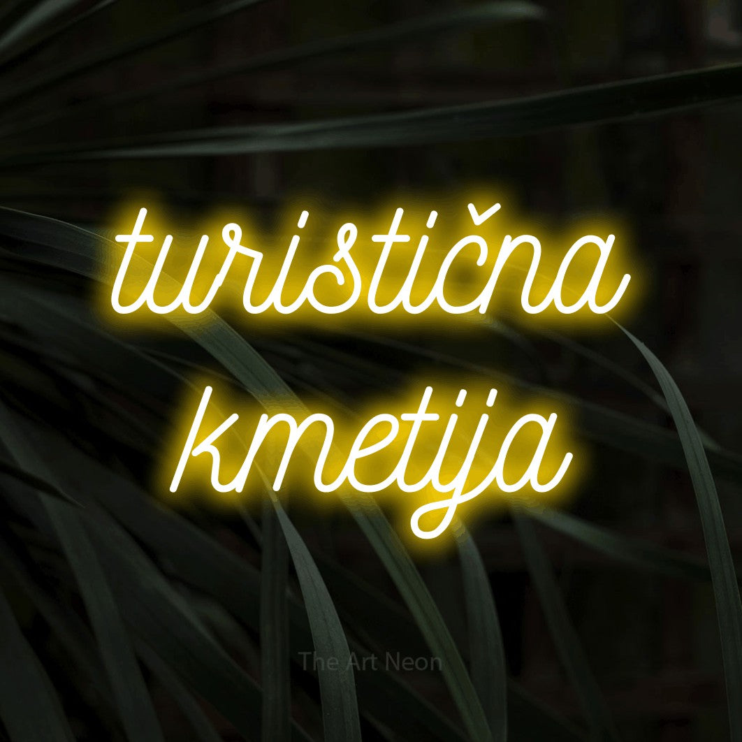 LED neon sign reading “turistična kmetija”, arranged in two lines.