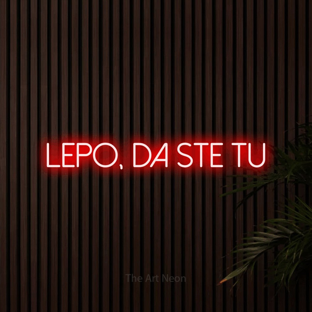 LED neon sign reading “lepo, da ste tu”, arranged in a single line.