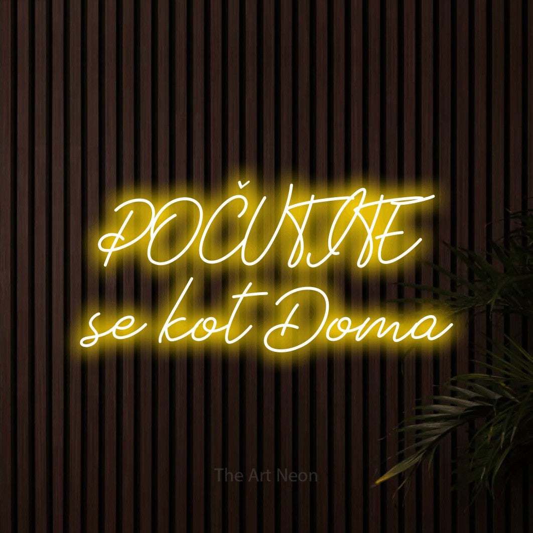 LED neon sign reading “POČUTITE se kot Doma”, arranged in two lines.