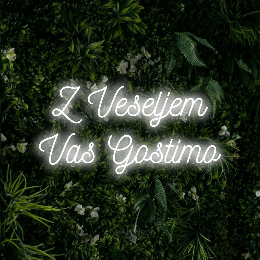 LED neon sign reading “Z Veseljem Vas Gostimo”, arranged in two lines.