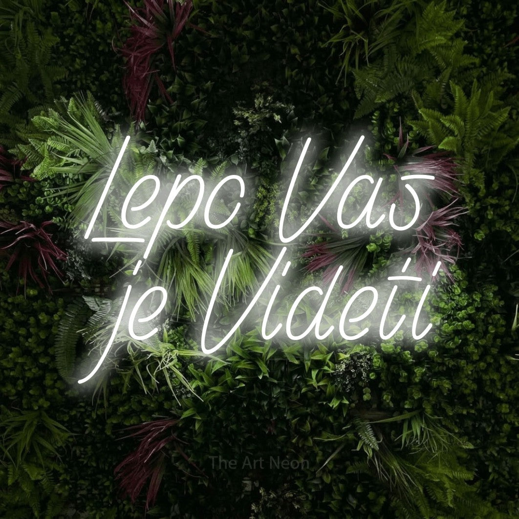 LED neon sign reading “Lepo Vas je Videti”, arranged in two lines.