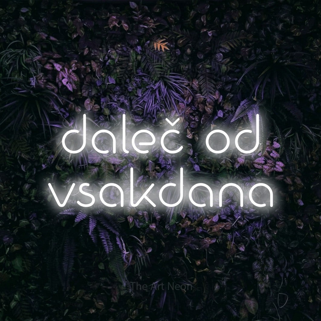 LED neon sign reading “daleč od vsakdana”, arranged in two lines.
