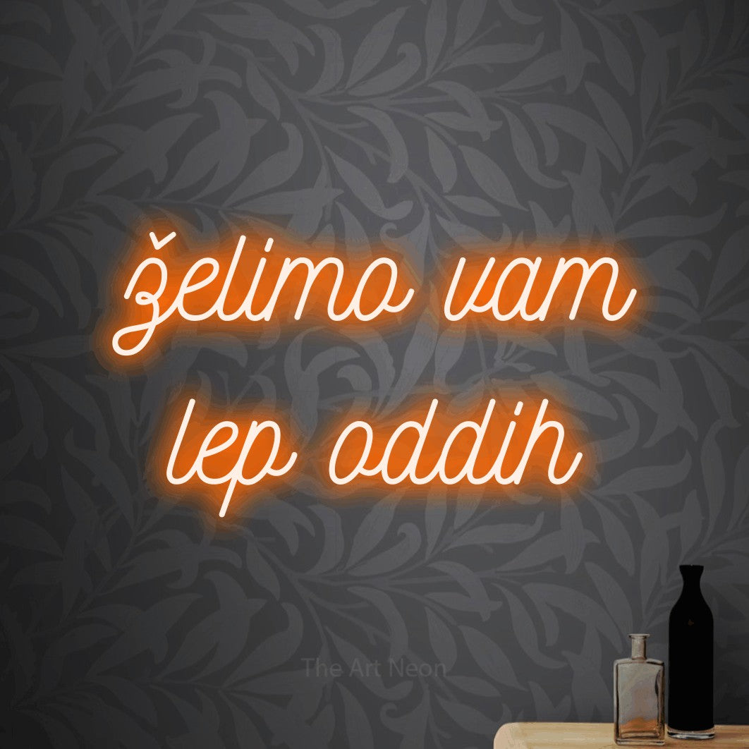 LED neon sign reading “želimo vam lep oddih”, arranged in two lines.
