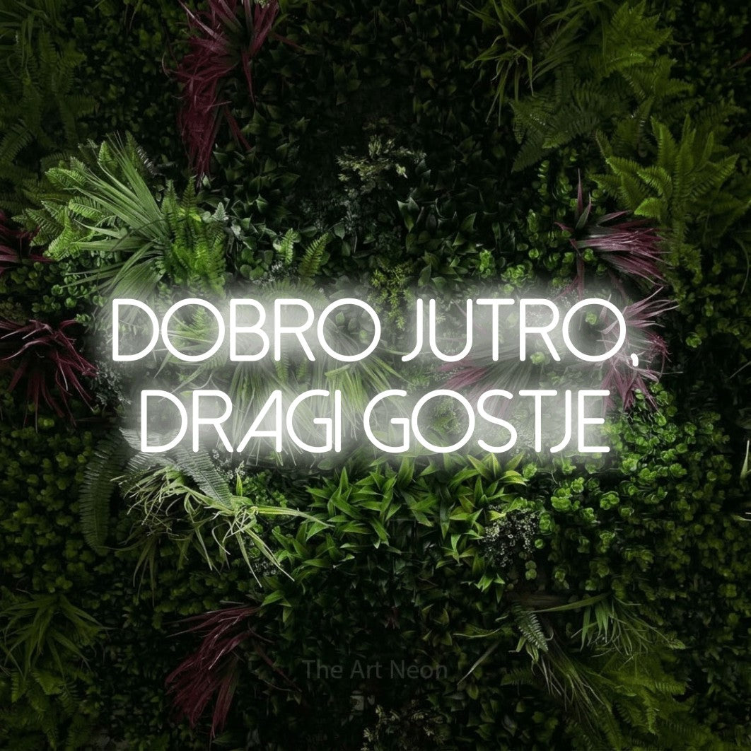 LED neon sign reading “DOBRO JUTRO, DRAGI GOSTJE”, arranged in two lines.