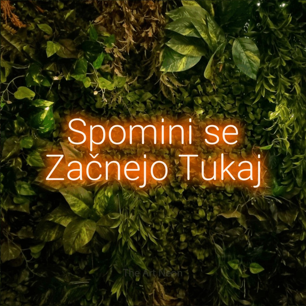 LED neon sign reading “Spomini se Začnejo Tukaj”, arranged in two lines.
