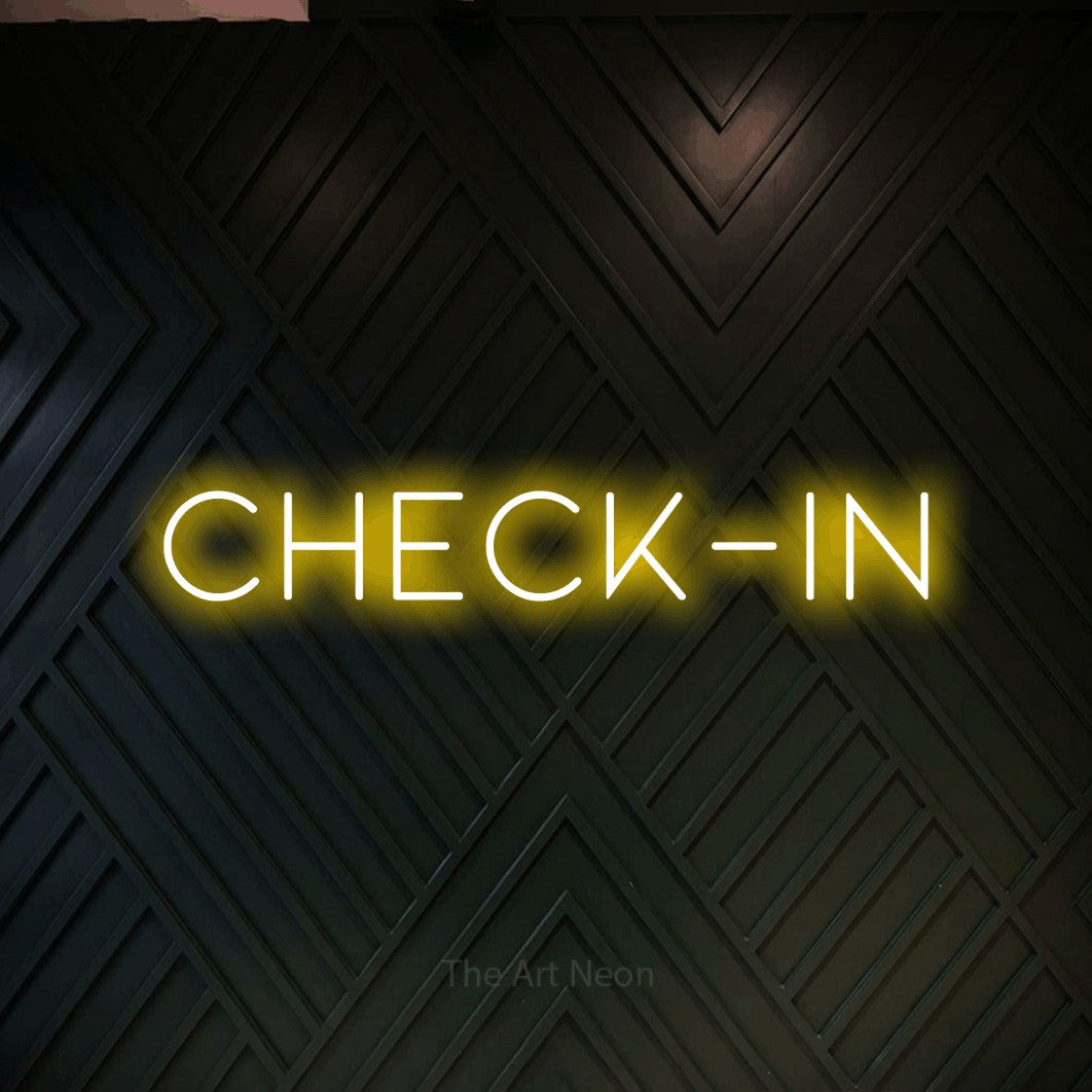 LED neon sign reading “Check-in”, arranged in a single line.