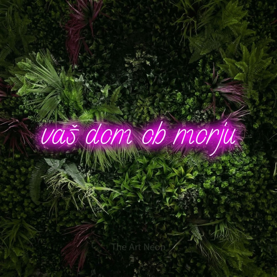 LED neon sign reading “vaš dom ob morju”, arranged in a single line.