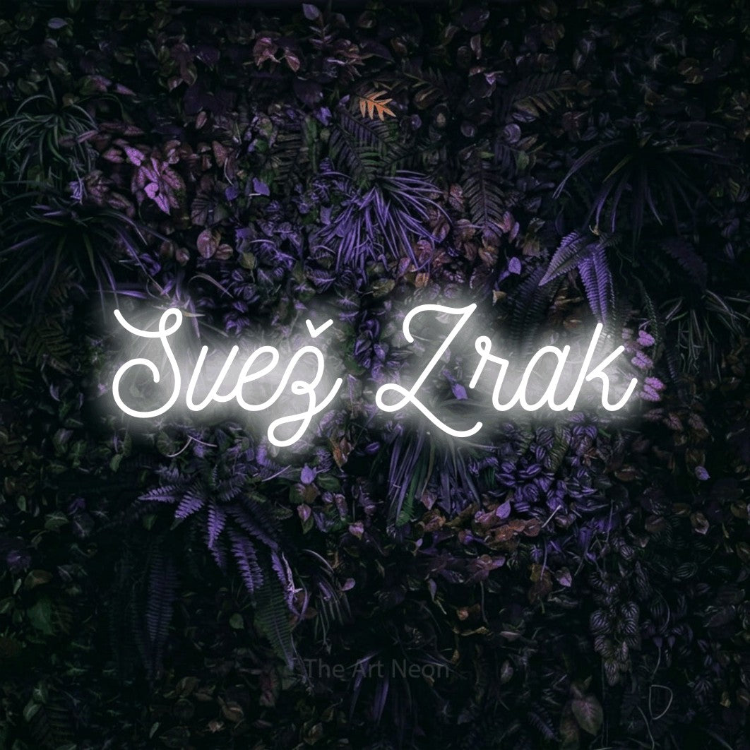 LED neon sign reading “Svež Zrak”, arranged in a single line.