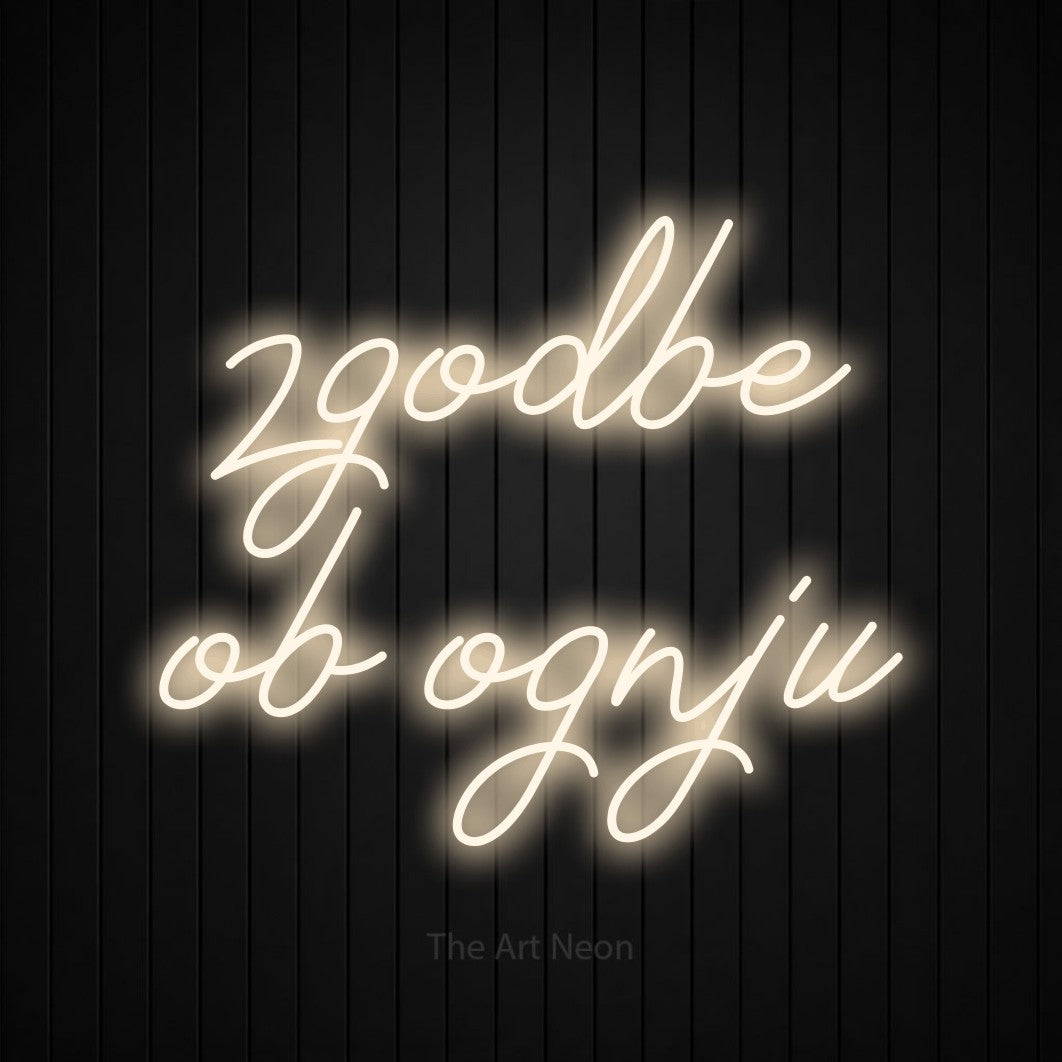 LED neon sign reading “zgodbe ob ognju”, arranged in two lines.