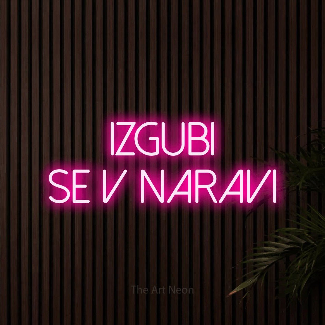LED neon sign reading “IZGUBI SE V NARAVI”, arranged in two lines.