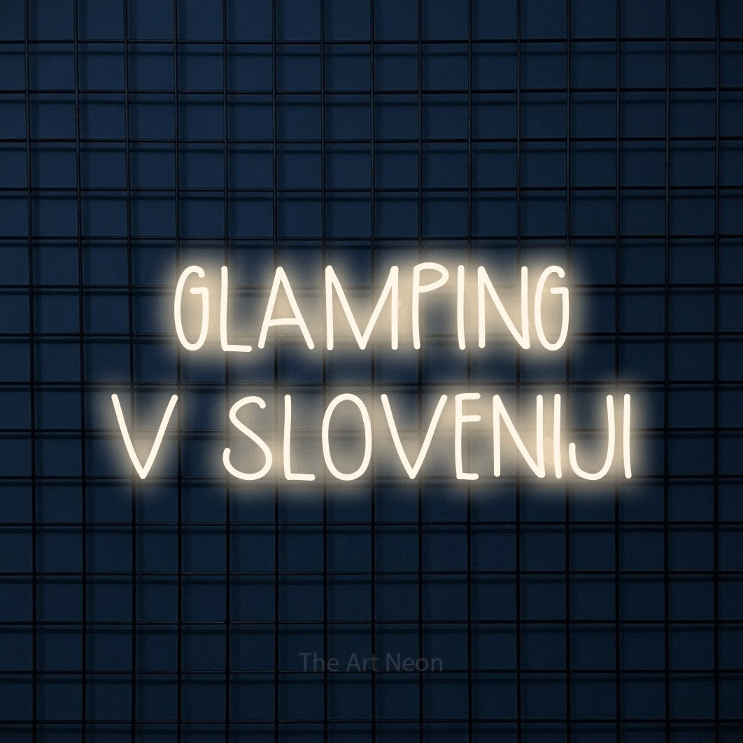 LED neon sign reading “GLAMPING V SLOVENIJI”, arranged in two lines.