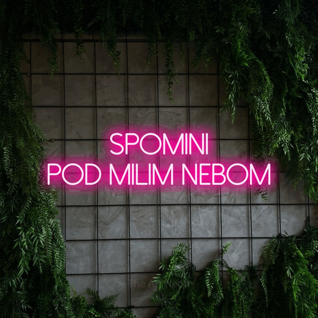 LED neon sign reading “spomini pod milim nebom”, arranged in two lines.