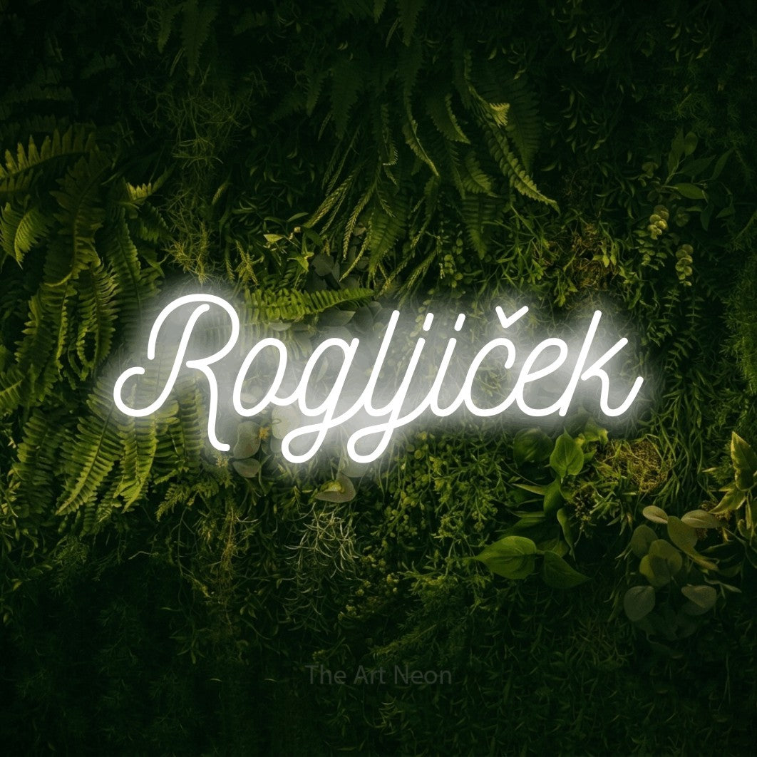LED neon sign reading “Rogljiček”, arranged in a single line.