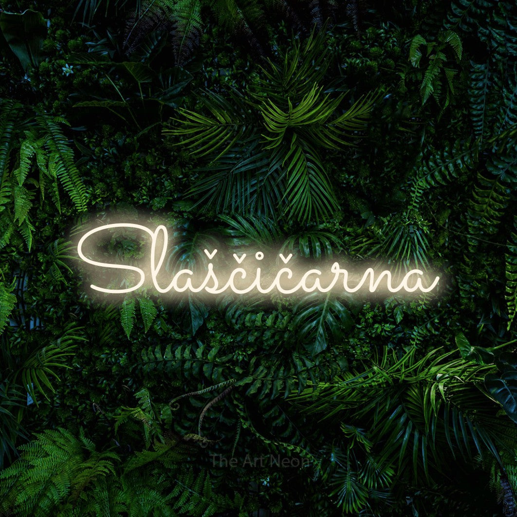 LED neon sign reading “Slaščičarna”, arranged in a single line.