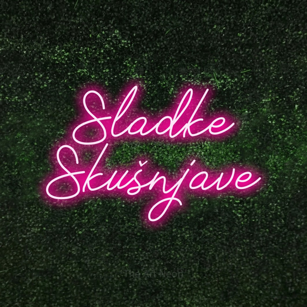 LED neon sign reading “Sladke Skušnjave”, arranged in two lines.