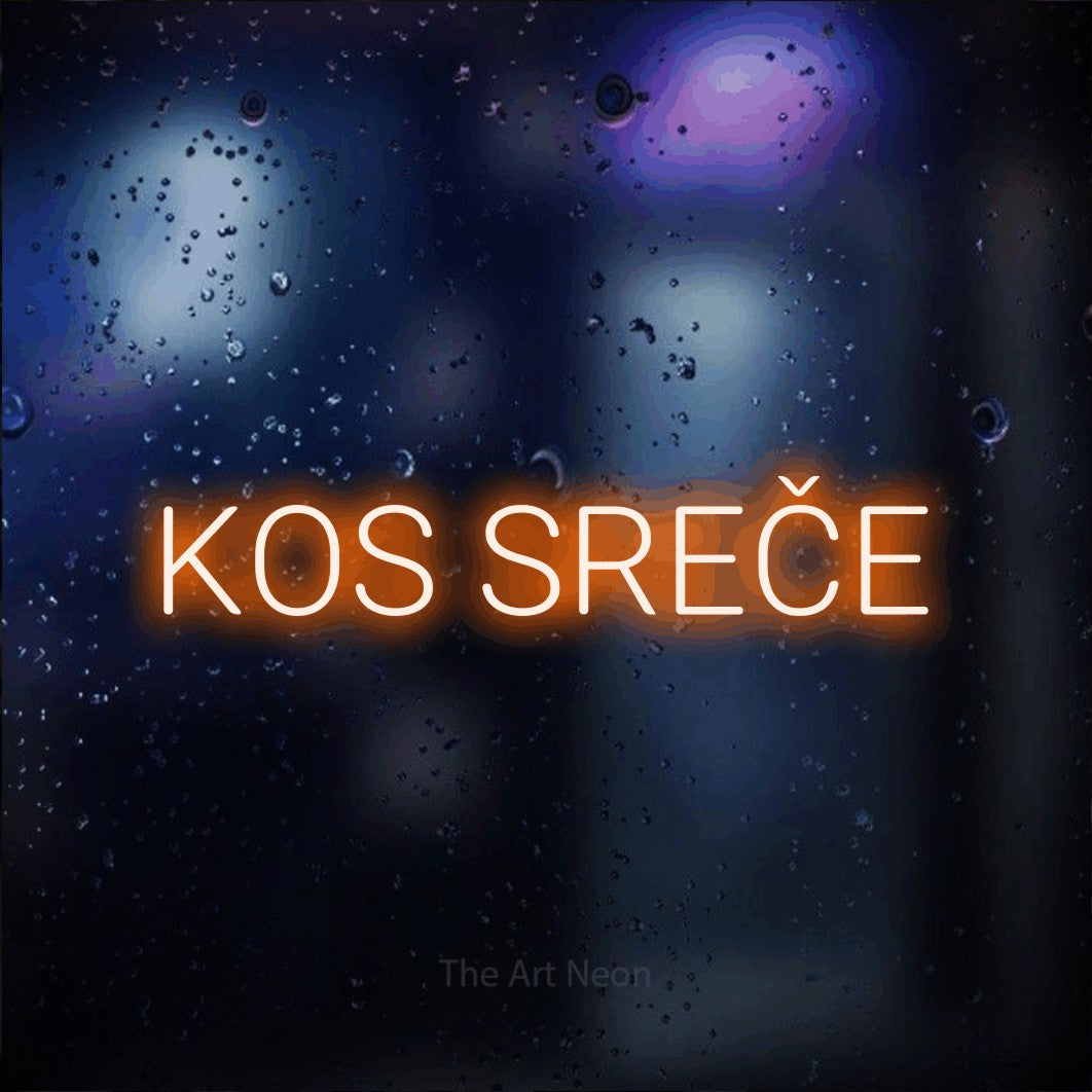 LED neon sign reading “KOS SREČE”, arranged in a single line.