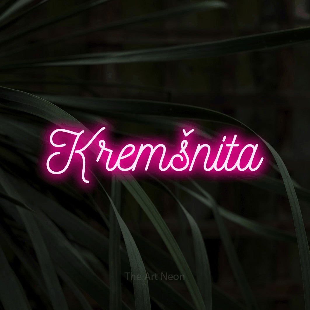 LED neon sign reading “Kremšnita”, arranged in a single line.