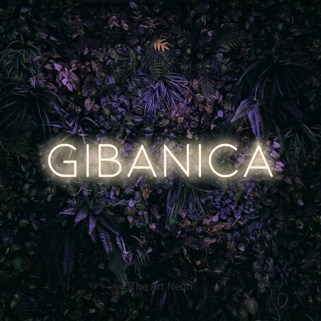 LED neon sign reading “GIBANICA”, arranged in a single line.