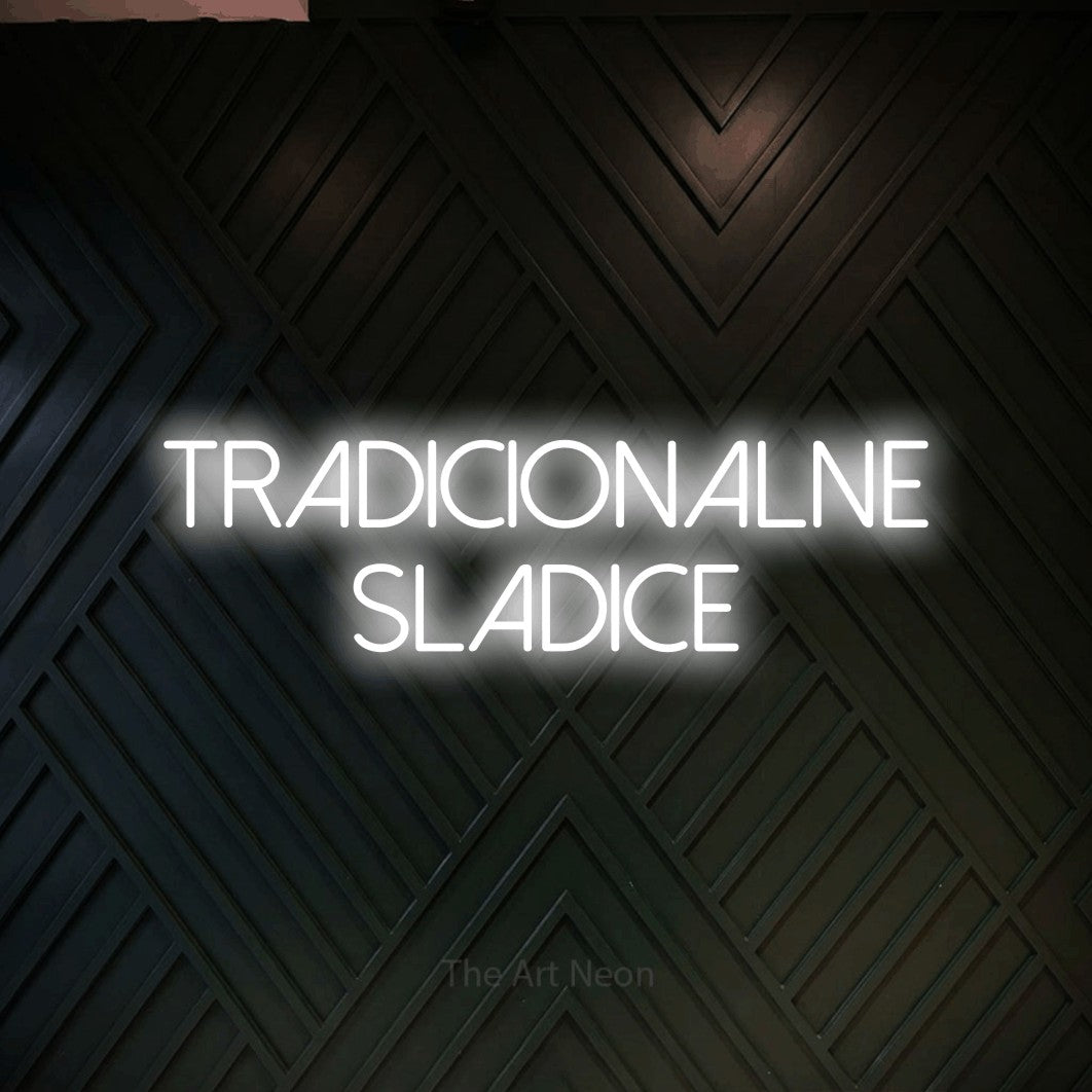 LED neon sign reading “TRADICIONALNE SLADICE”, arranged in two lines.