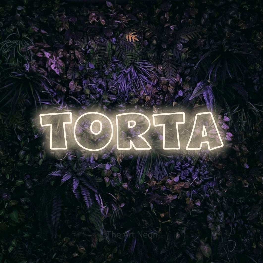 LED neon sign reading “Torta”, arranged in a single line.