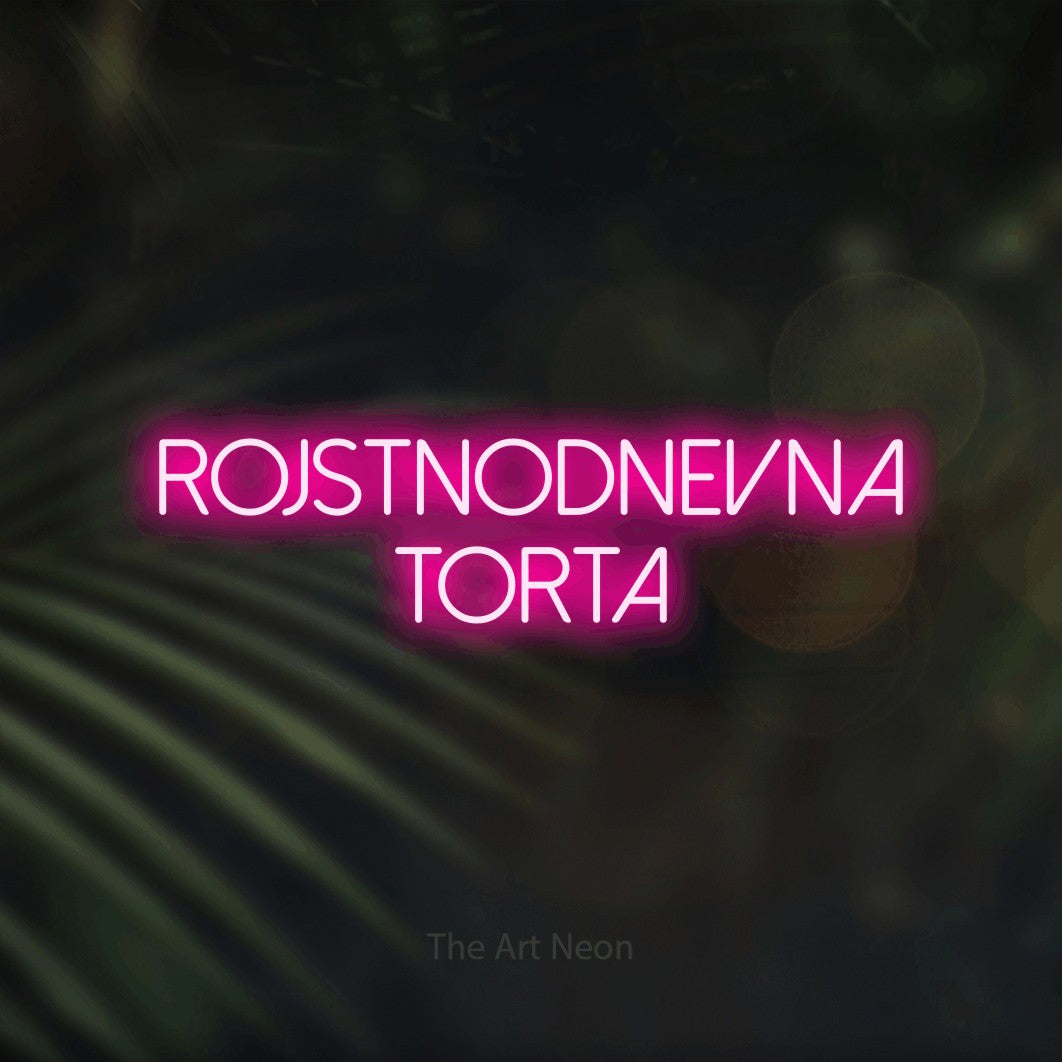 LED neon sign reading “rojstnodnevna torta”, arranged in two lines.