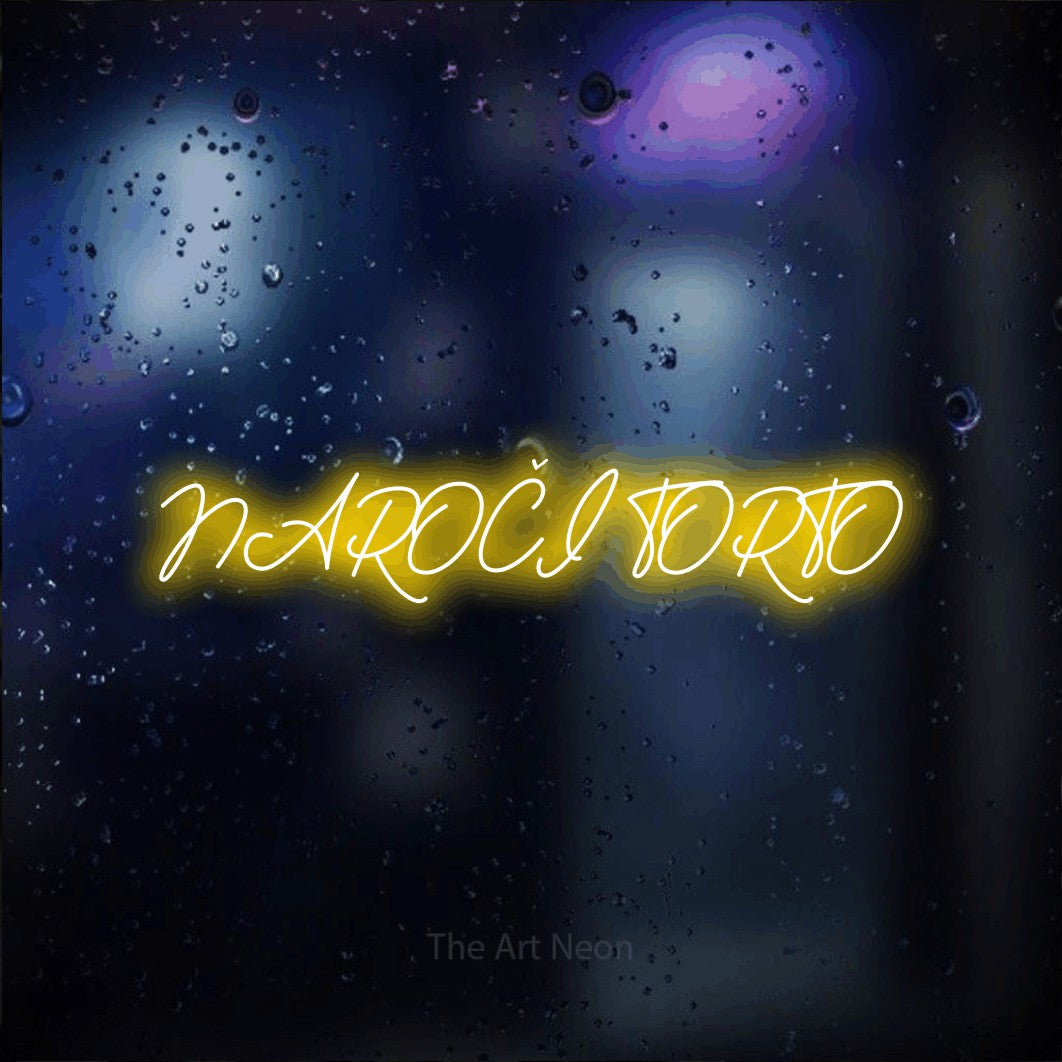 LED neon sign reading “NAROČI TORTO”, arranged in a single line.