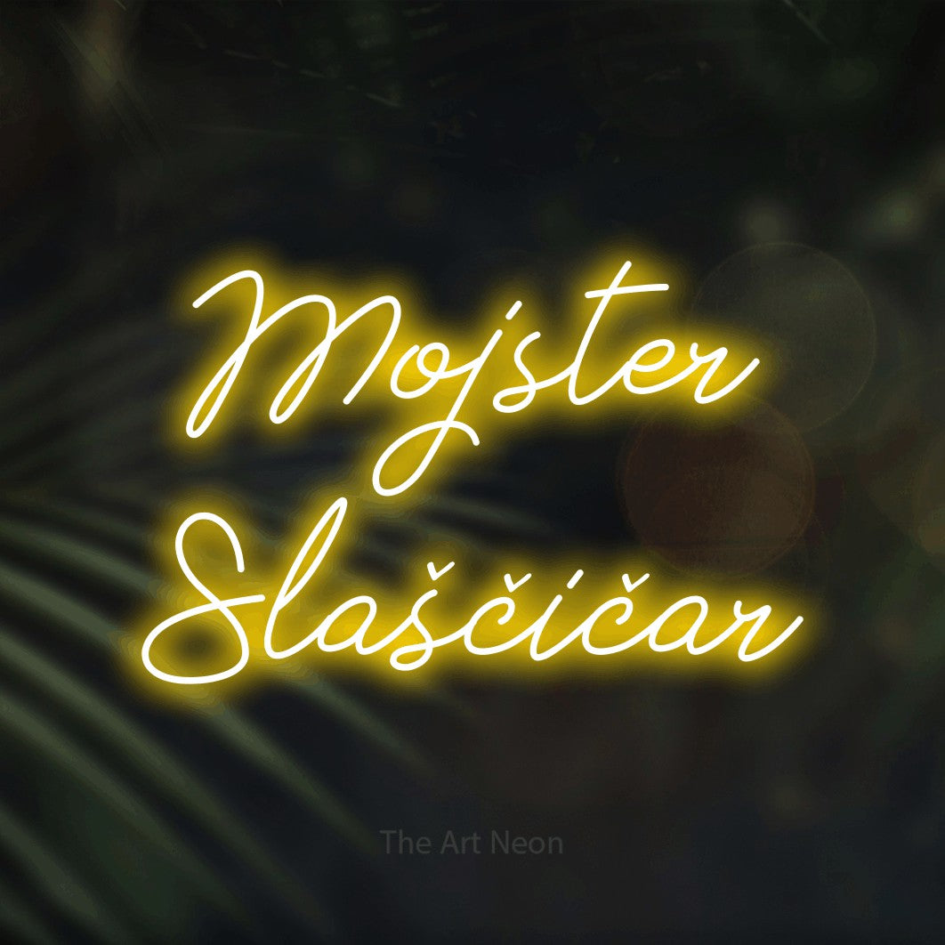 LED neon sign reading “Mojster Slaščičar”, arranged in two lines.