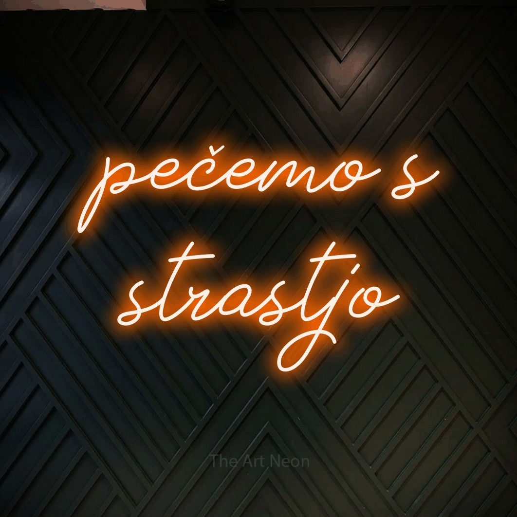 LED neon sign reading “pečemo s strastjo”, arranged in two lines.