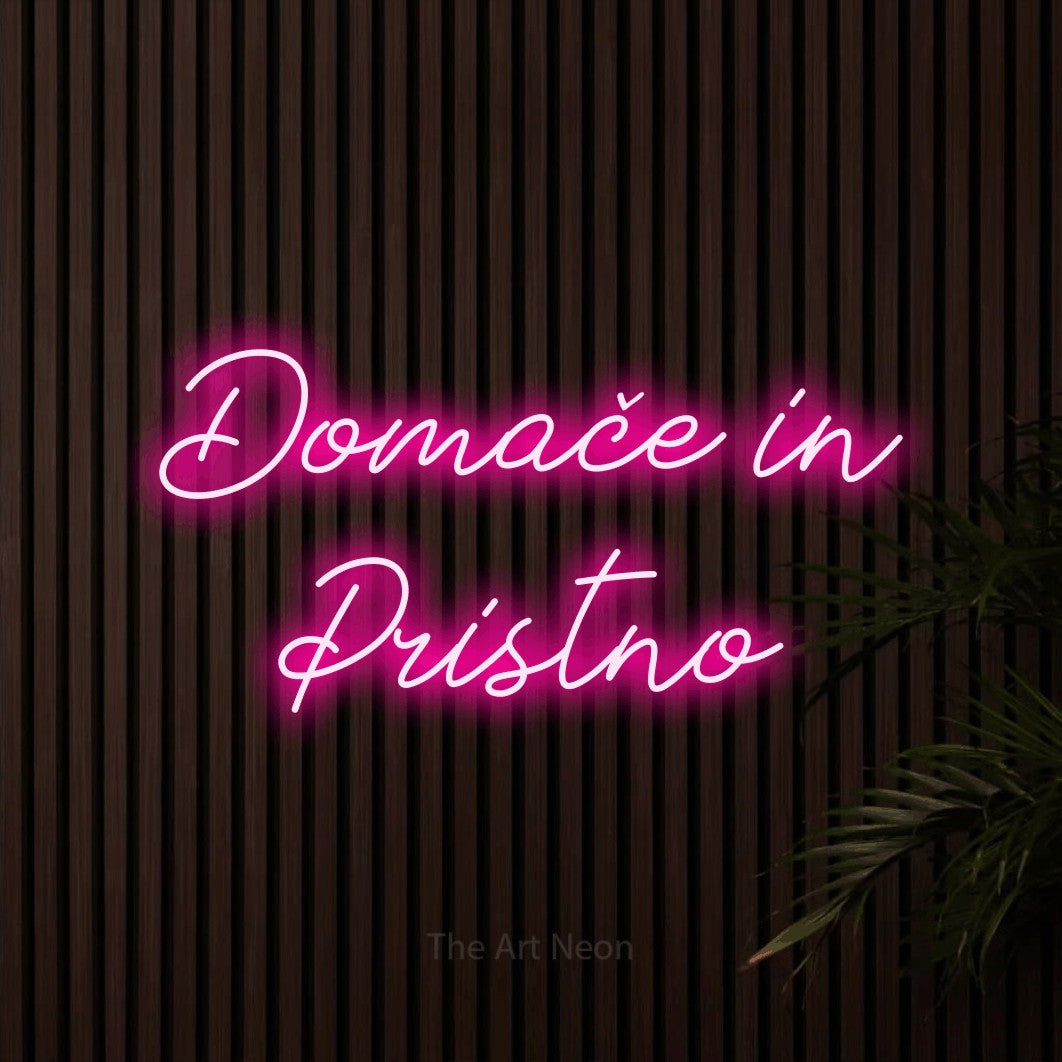 LED neon sign reading “Domače in Pristno”, arranged in two lines.