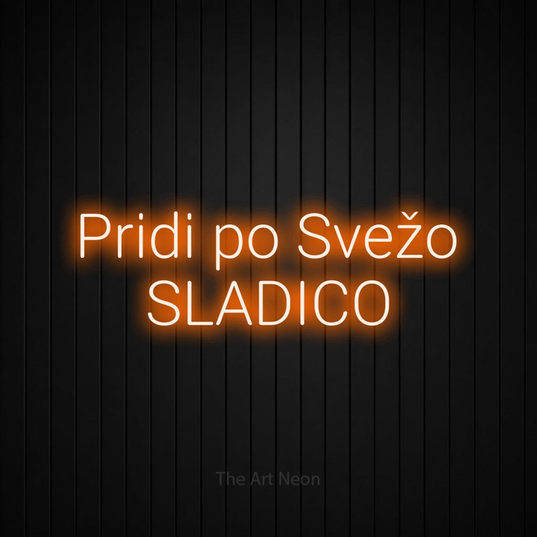 LED neon sign reading “Pridi po Svežo SLADICO”, arranged in two lines.