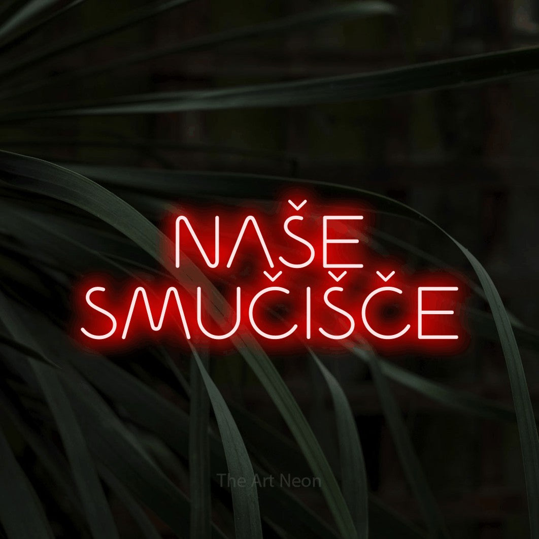 LED neon sign reading “NAŠE SMUČIŠČE”, arranged in two lines.