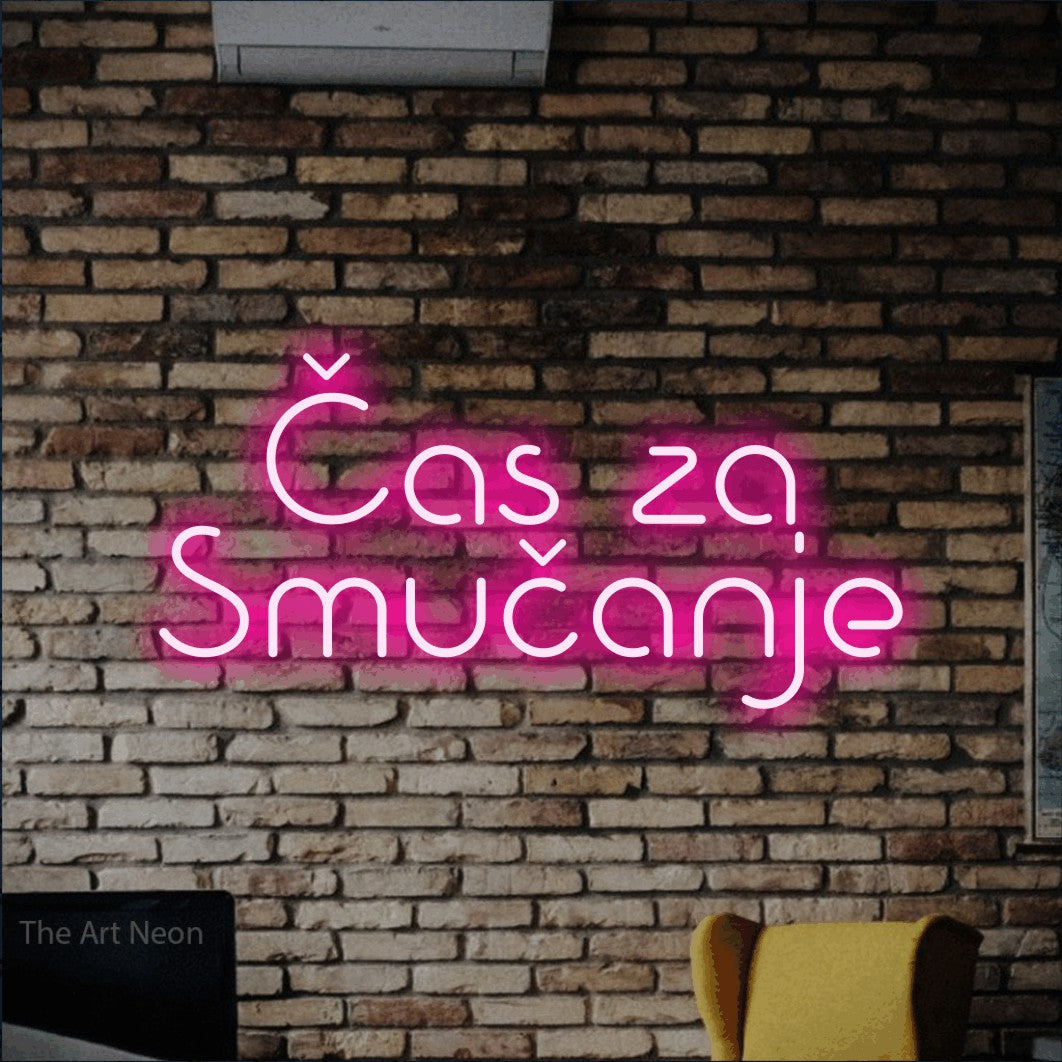 LED neon sign reading “Čas za Smučanje”, arranged in two lines.