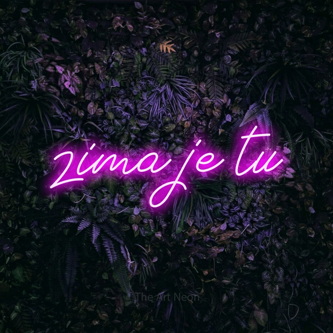 LED neon sign reading “zima je tu”, arranged in a single line.