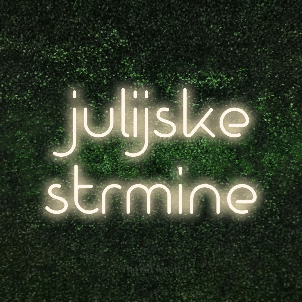 LED neon sign reading “julijske strmine”, arranged in two lines.