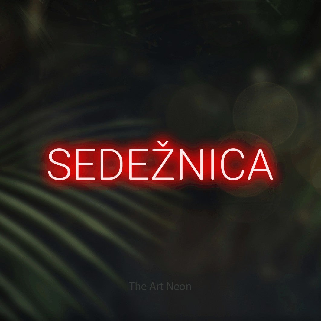 LED neon sign reading “SEDEŽNICA”, arranged in a single line.