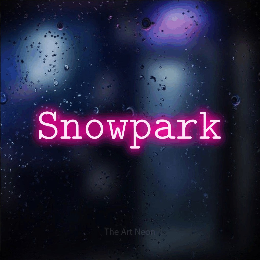 LED neon sign reading “Snowpark”, arranged in a single line.