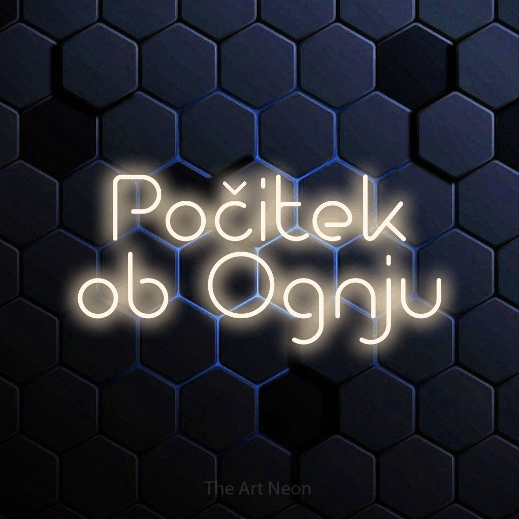 LED neon sign reading “Počitek ob Ognju”, arranged in two lines.
