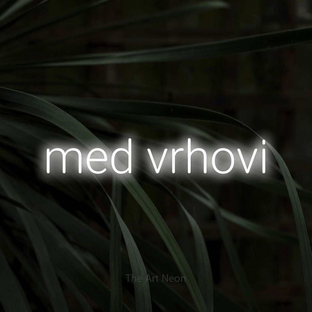 LED neon sign reading “med vrhovi”, arranged in a single line.