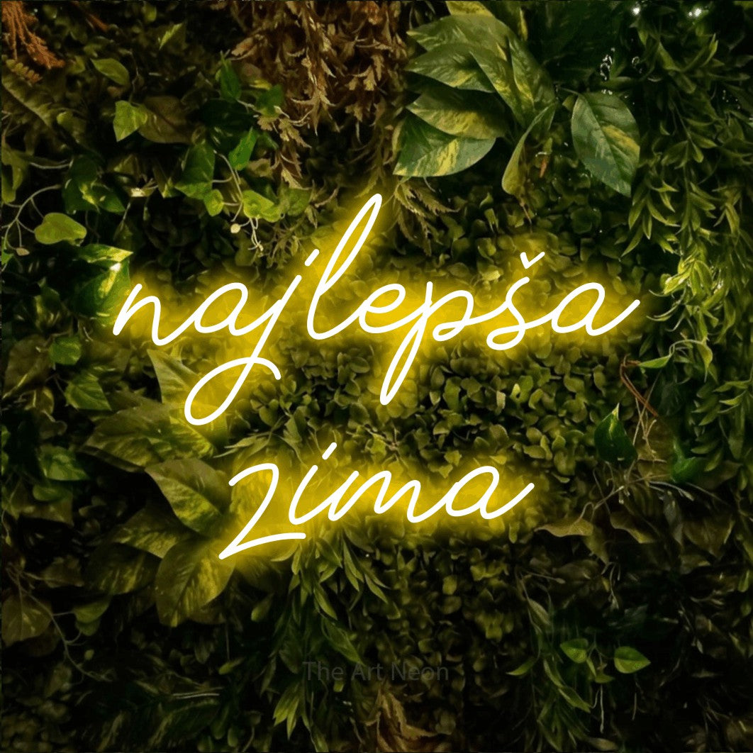 LED neon sign reading “najlepša zima”, arranged in two lines.