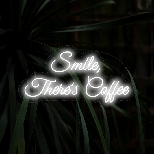 "Smile, There's Coffee Neon Sign" spreads cheer with its uplifting message and coffee cup design, casting a delightful glow for a positive and warm ambiance in your space.