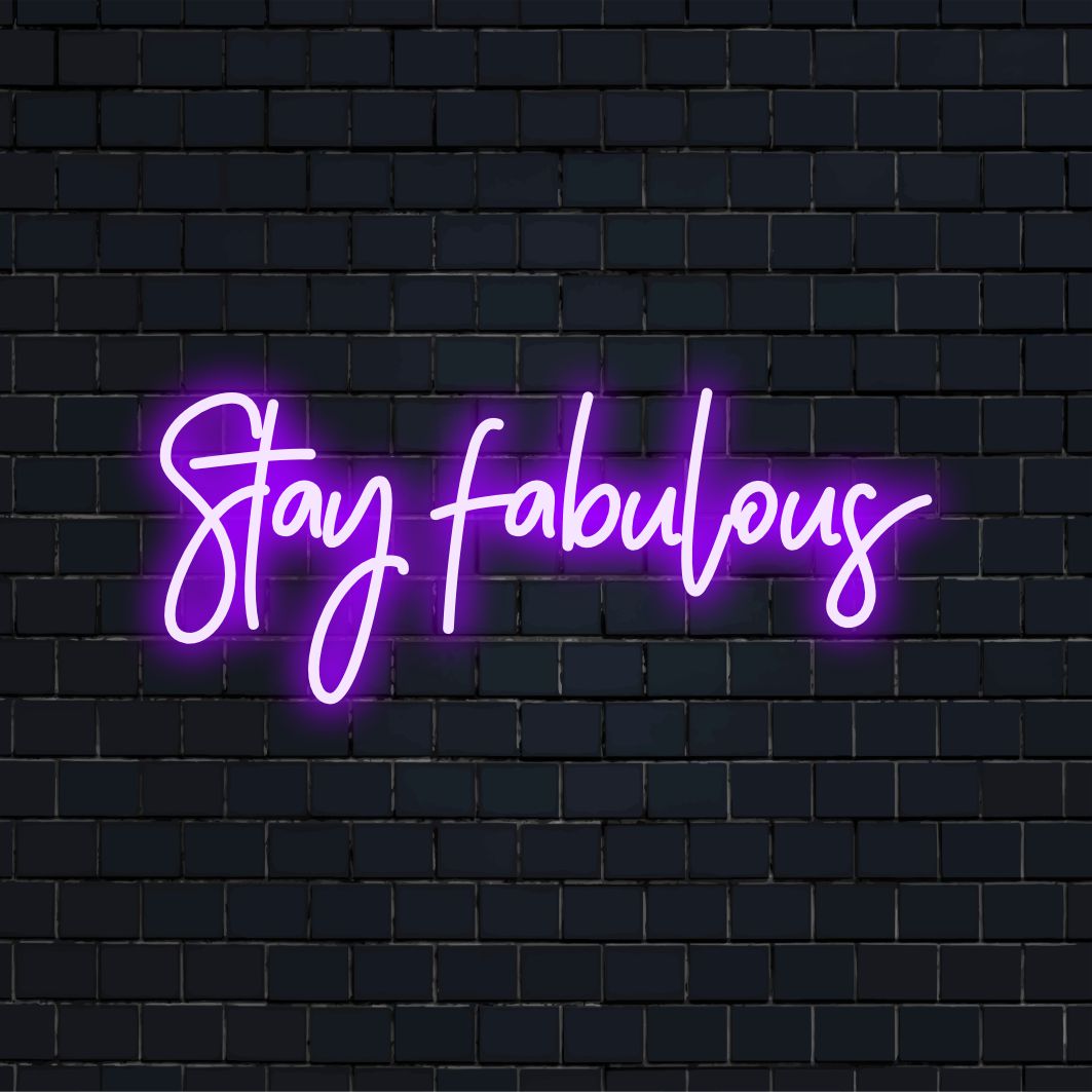 LED neon sign in bright pink script reads Stay Fabulous, a chic addition for any room; ideal light decor.